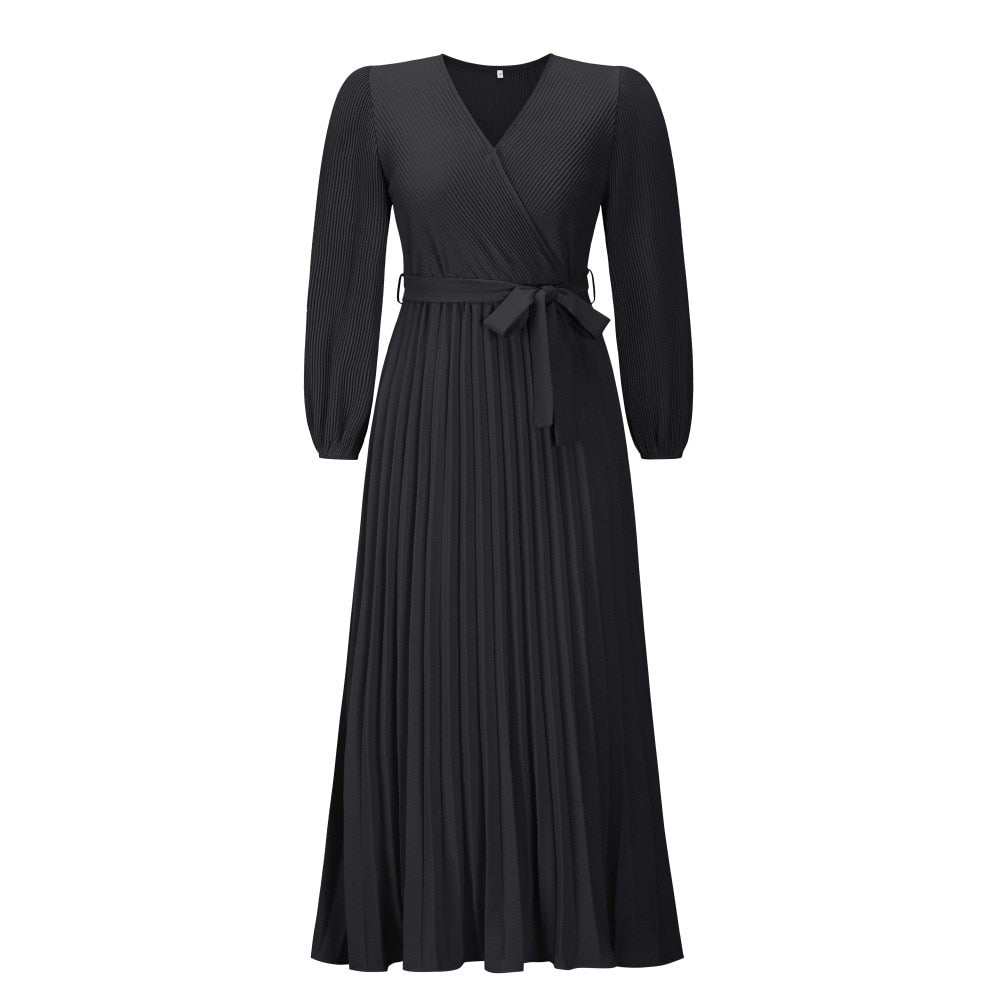 Dames lente/zomer maxi jurk met V-hals, geplooid lijfje en modieus groot zoom ontwerp.