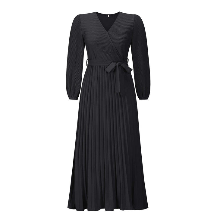 Dames lente/zomer maxi jurk met V-hals, geplooid lijfje en modieus groot zoom ontwerp.
