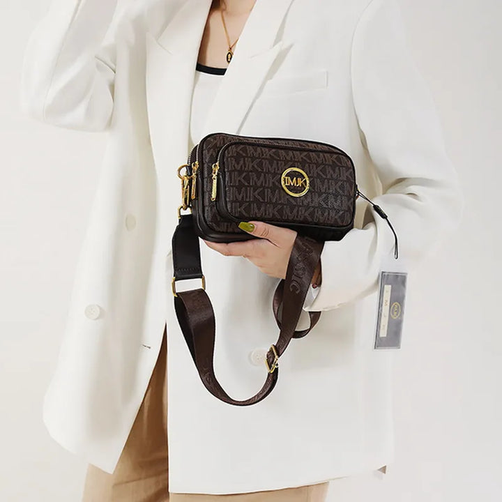 Stijlvolle bruine luxe schoudertas voor dames, perfect als crossbody of handtas.