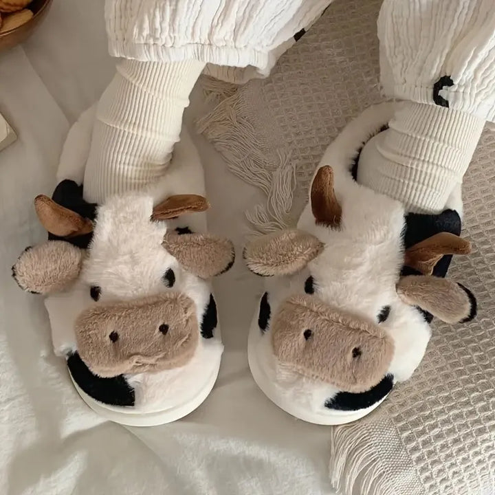 Close-up van de zachte textuur van Jamie dames pantoffels, comfortabele en warme winter huisschoenen.