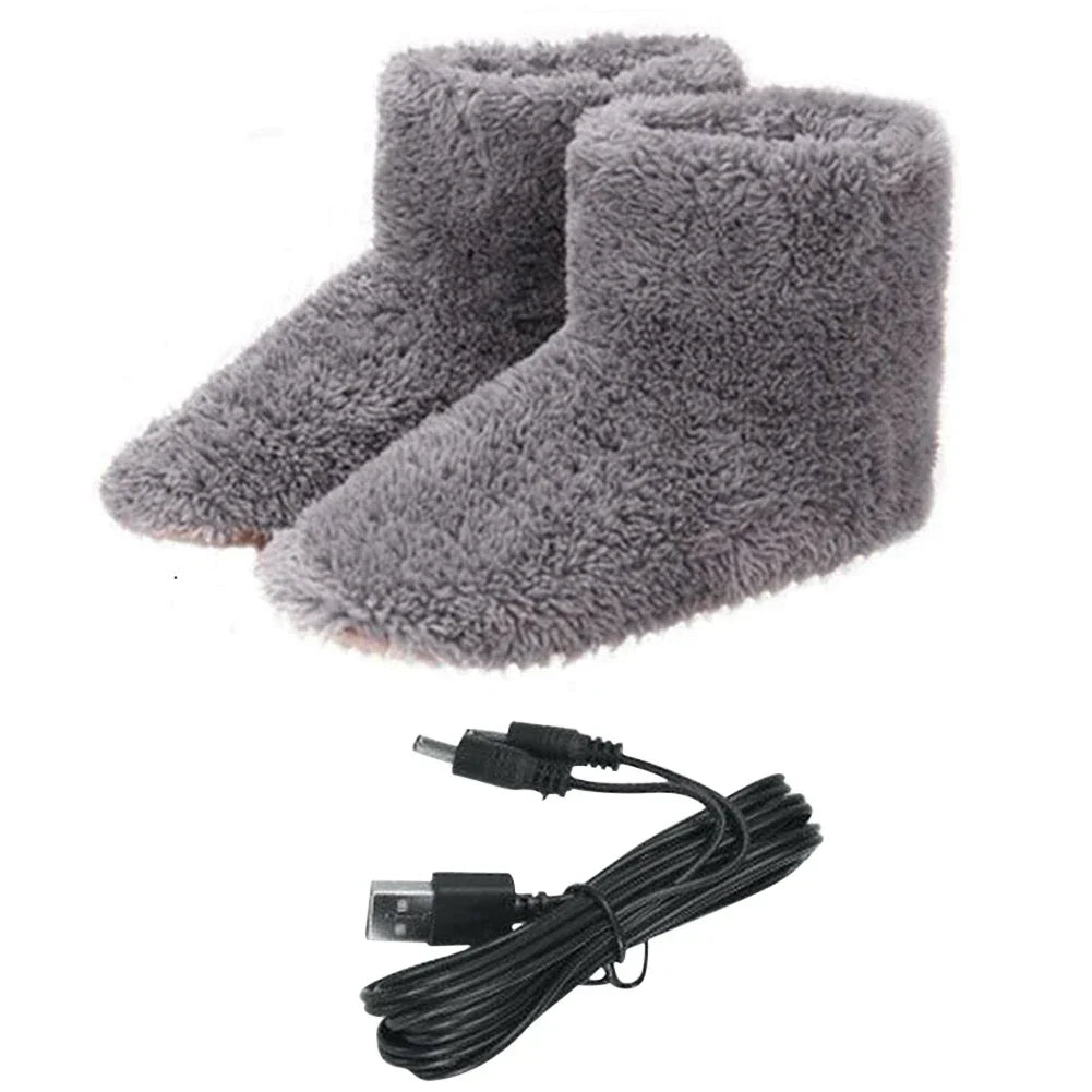 Een paar grijze verwarmde pantoffels, USB oplaadbaar. Deze energiezuinige huisschoenen zijn ideaal voor koude voeten.