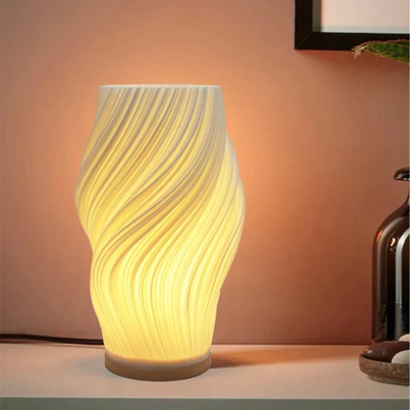 Unieke LED design tafellamp in verschillende vormen (spiraal, golven, wolken). Perfecte sfeermaker.
