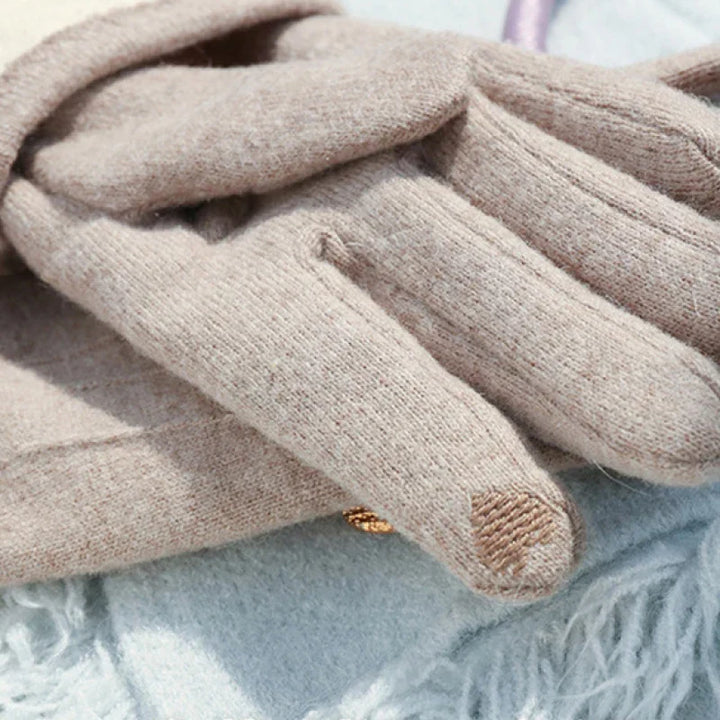 Modieuze touchscreen handschoenen van warm kasjmier, perfect voor winterse dagen. Houd je handen warm en functioneel.