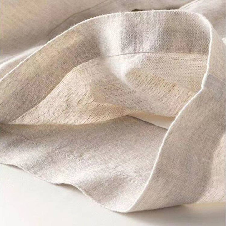 Elegante dames pantalon Diana met hoge taille en wijde pijpen, perfect voor een zakelijke of klassieke outfit. Beige kleur.