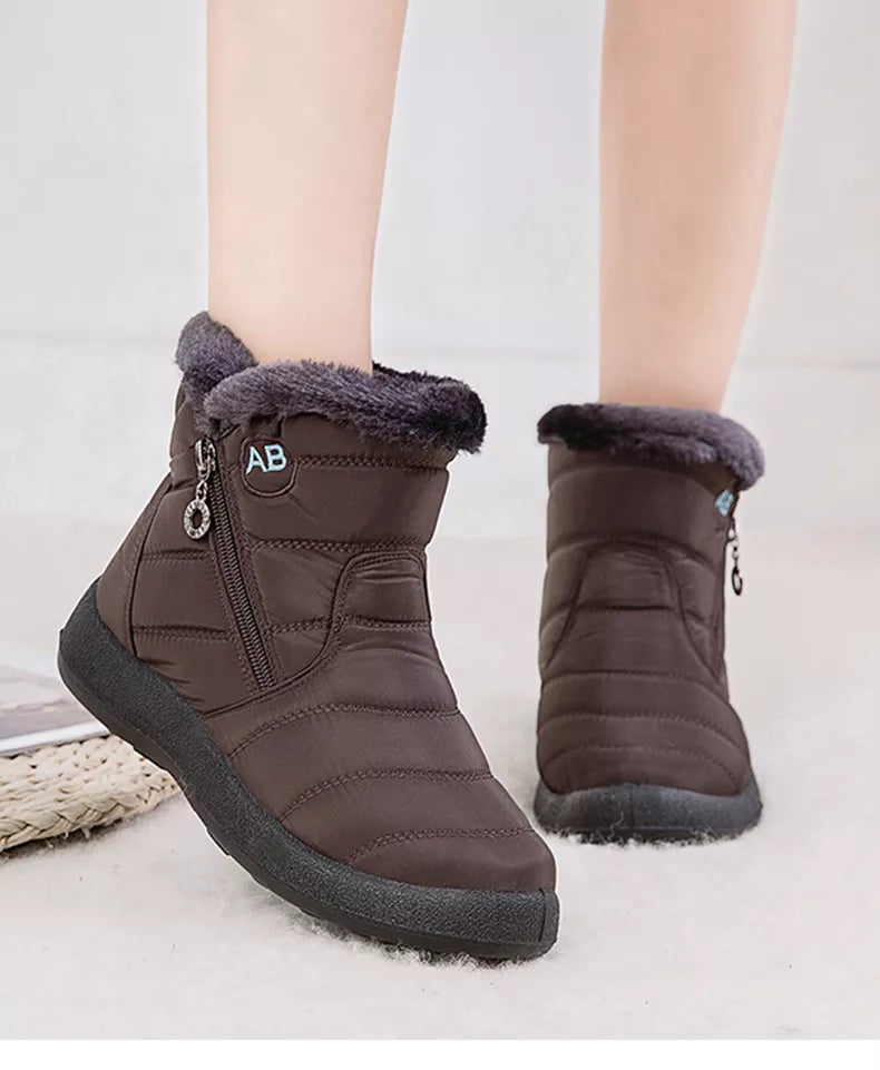 Warme dames snowboots met ritssluiting, waterdicht en antislip voor veilige stappen.