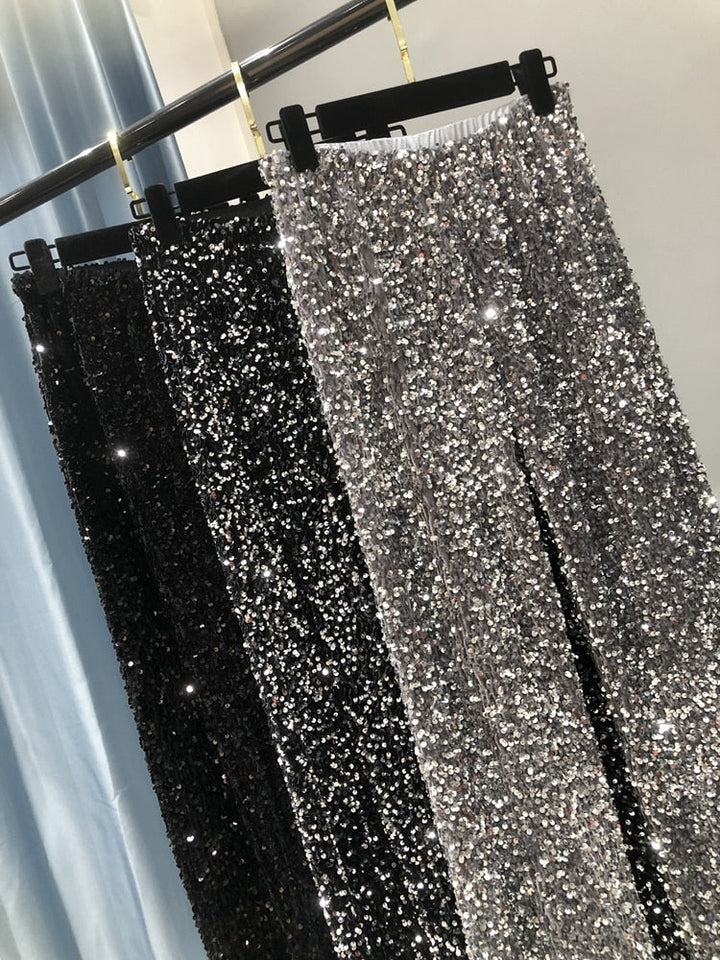 Glamoureuze dames pantalon met glitter en wijde pijpen, ideale avondkleding voor een schitterende look.