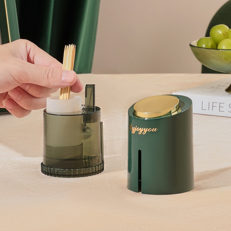 Hygiënische pop-up tandenstoker opberger met elegant design; een must-have tafelaccessoire voor elk huis.
