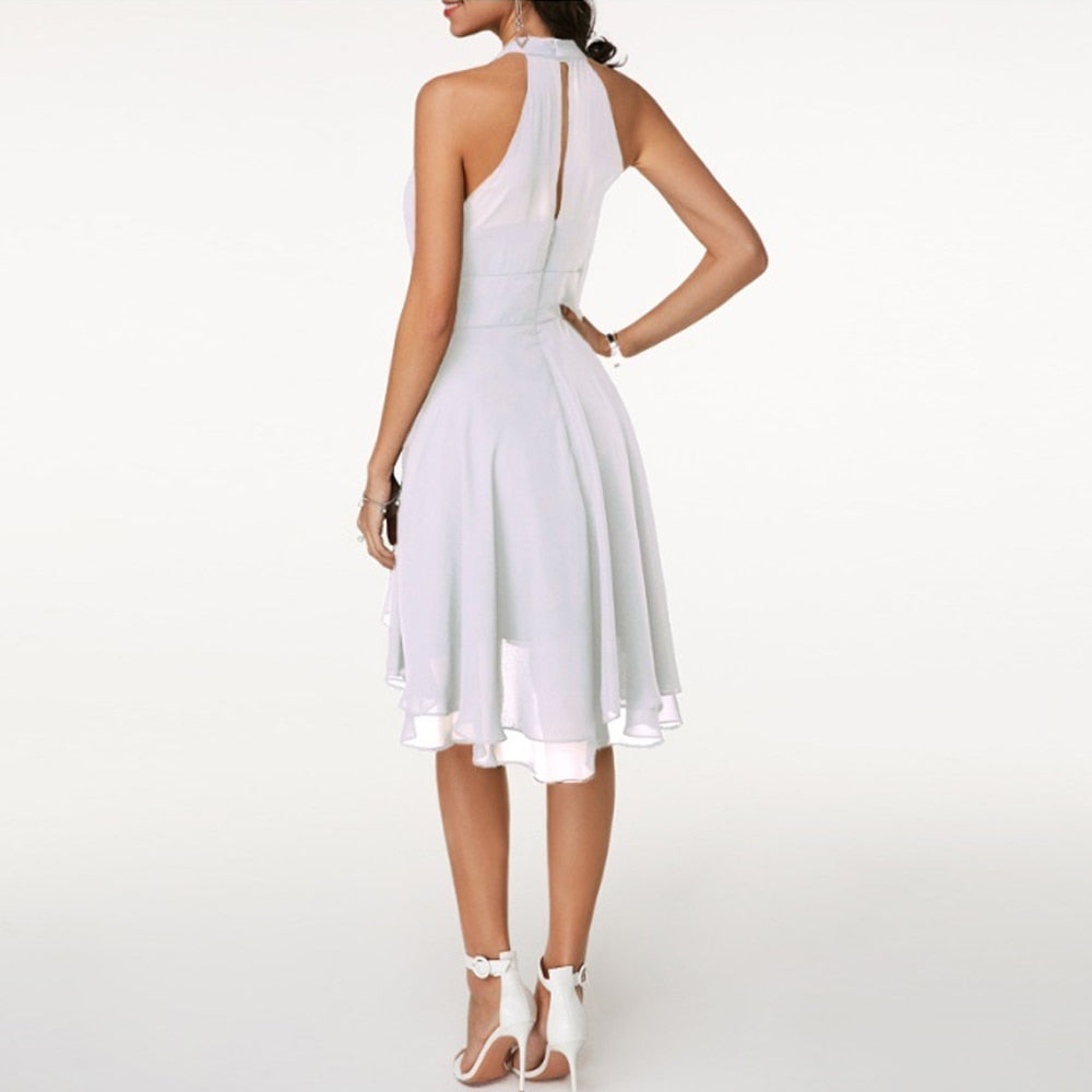 Comfortabele casual zomerjurk voor dames met speelse ruches en luchtige stof; ideaal voor strand en terras.