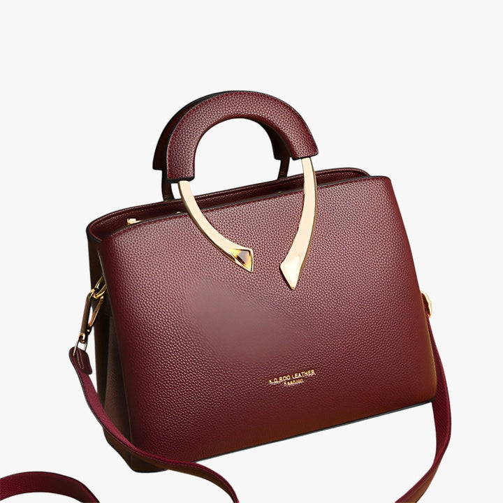 Duurzame leren dames tas, detail van achterkant, georganiseerd design en hoge kwaliteit leer.