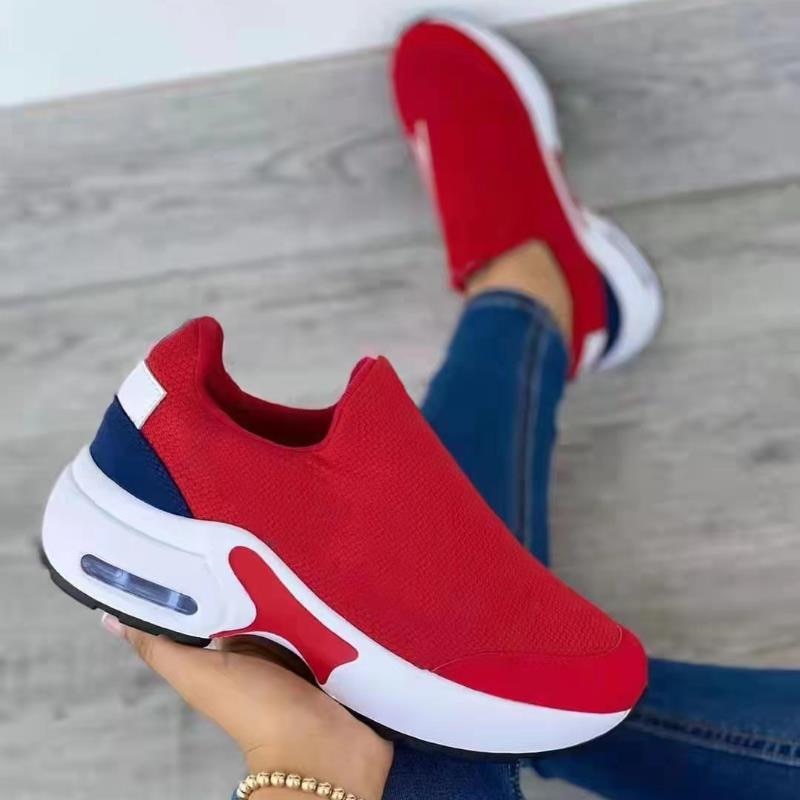 Heldere rode dames sneakers met ingebouwde orthopedische zool voor superieur comfort en dagelijkse ondersteuning.