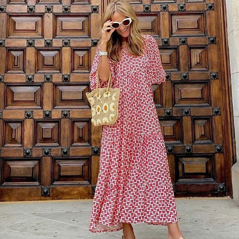 Trendy Boheemse V-hals jurk met pofmouwen. Een must-have voor zomerse dagen.