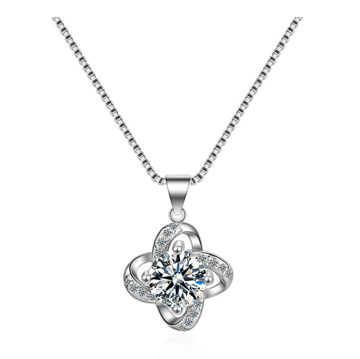Complete dames Liefdesknoop sieraden set: ketting & oorbellen met zirkonia. Elegant accessoire, verzilverd.