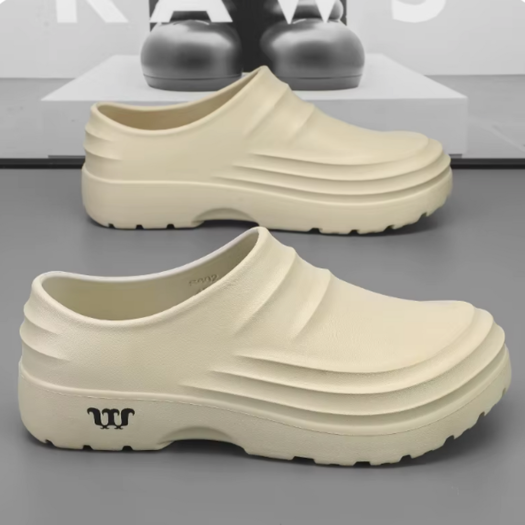 Ergonomische AquaStep clogs, waterdicht en lichtgewicht, ontworpen voor langdurig comfort en ondersteuning.