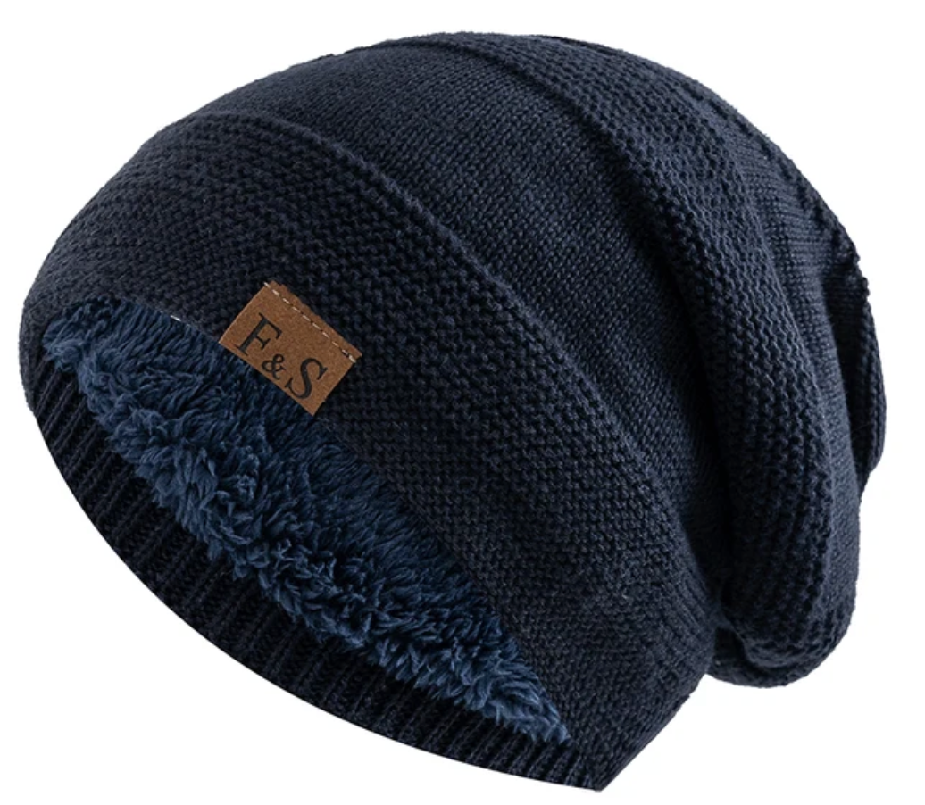 Warme heren wintermuts met slouch fit. Deze comfortabele muts houdt je hoofd stijlvol en behaaglijk in de kou.