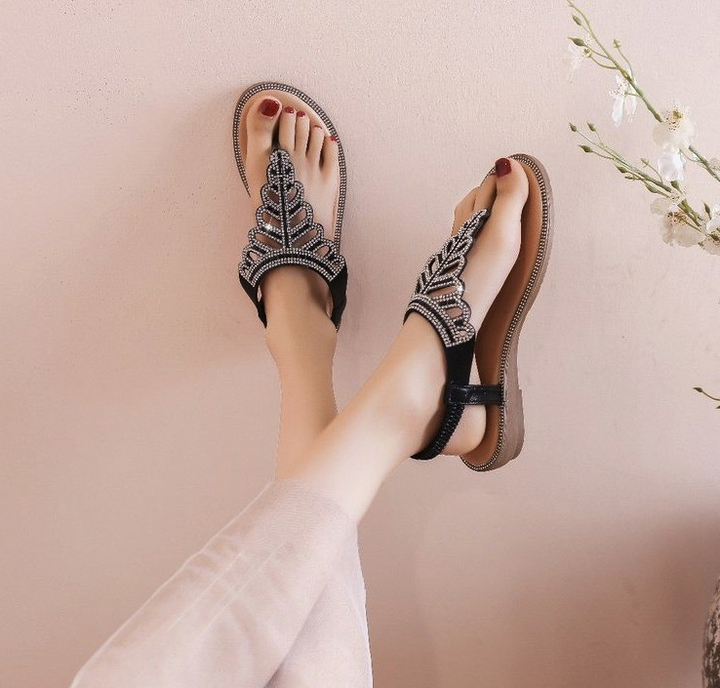 Elegante dames sandalen met glanzende strasssteentjes, perfect voor zomerse dagen en lente mode.