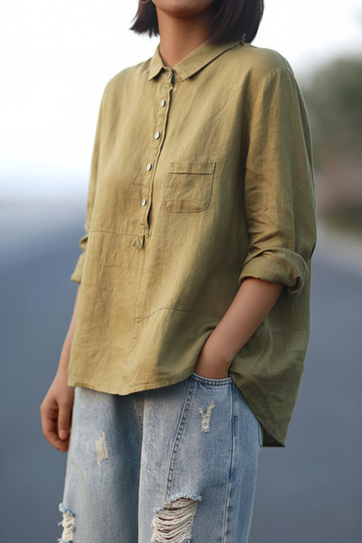 Veelzijdige jade dames trui met knoopsluiting. Gemakkelijk te stylen voor zowel casual als geklede momenten.