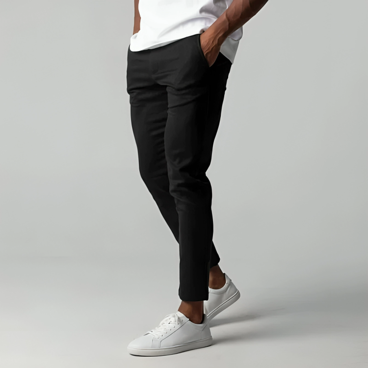 Nette smal toelopende herenbroek Adam. Stijlvolle stretchbroek met moderne pasvorm, perfect voor elke gelegenheid.