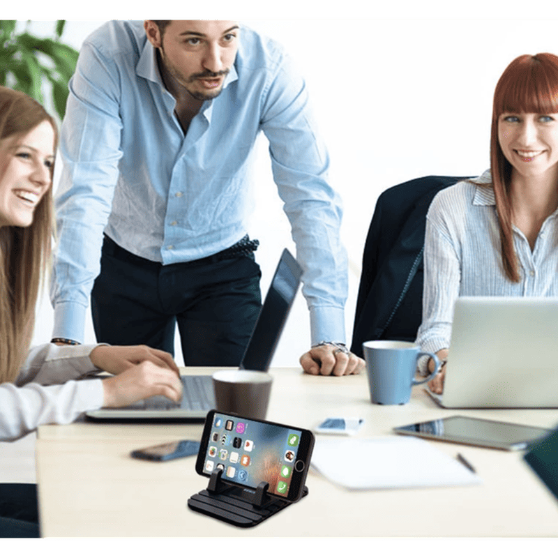 Flexibele siliconen antislip telefoonhouder; universeel bruikbaar voor auto, bureau, handsfree smartphone.