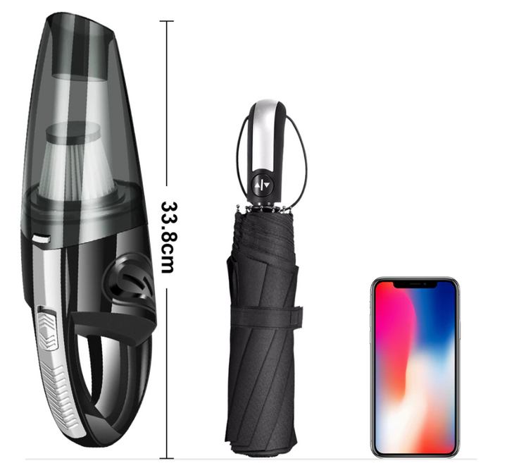 Een compacte handstofzuiger ligt in een hand, benadrukt lichtgewicht ontwerp voor gemakkelijk schoonmaken van stof.