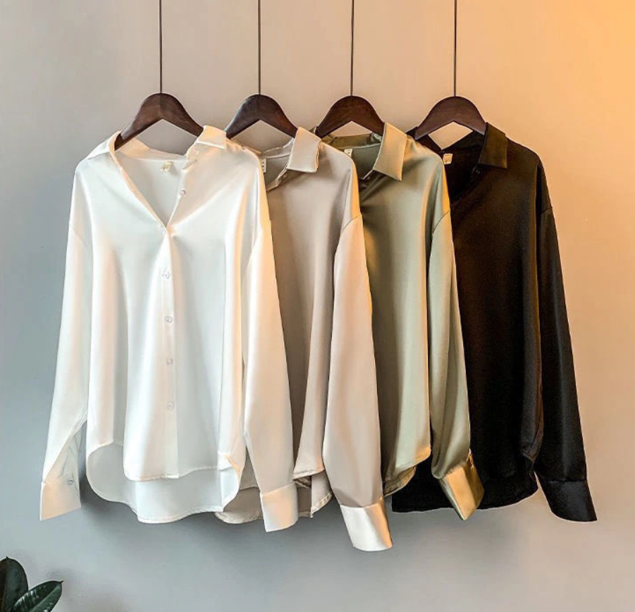 Elegante effen Myra damesblouse met lange mouwen, perfect voor zakelijke of formele gelegenheden.