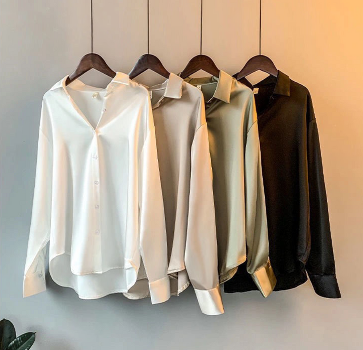 Elegante effen Myra damesblouse met lange mouwen, perfect voor zakelijke of formele gelegenheden.