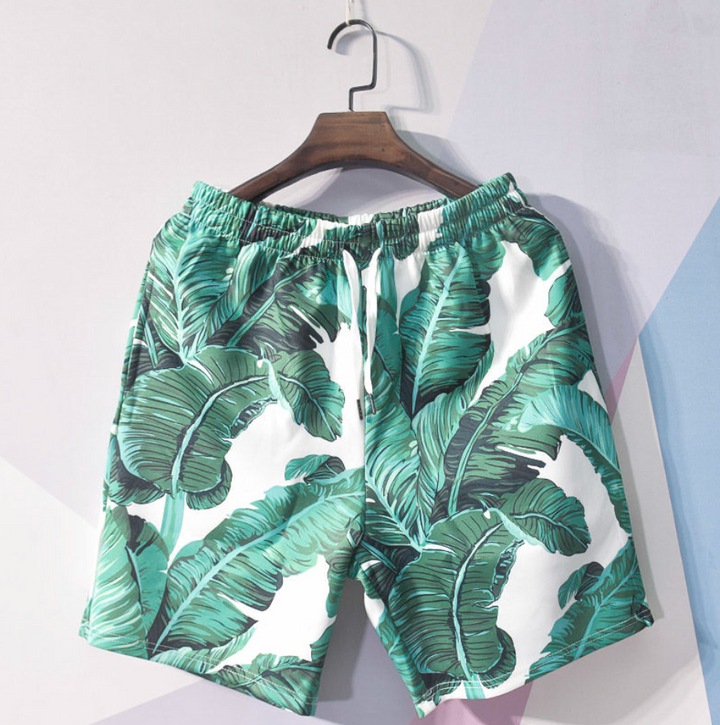 Heren trendy combiset in rood-groene Hawaii print, dé zomeroutfit voor strand en feest.