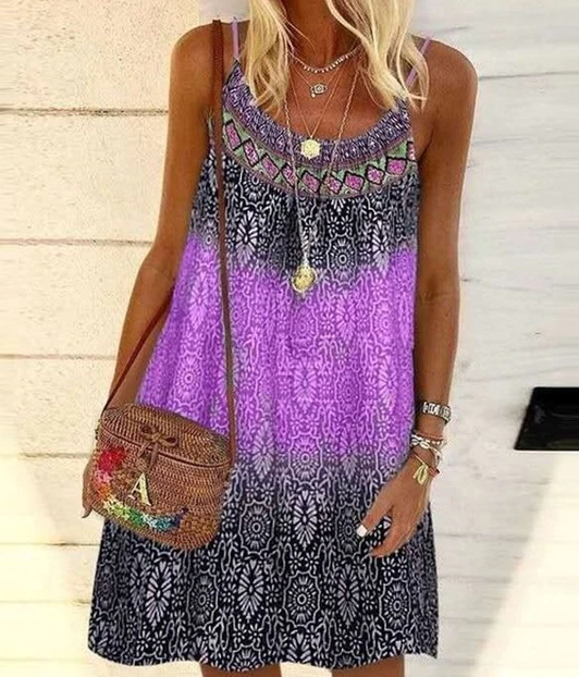 Fleurige dames zomerjurk met opvallende, levendige print. Comfortabele pasvorm, perfect als trendy casual jurk.