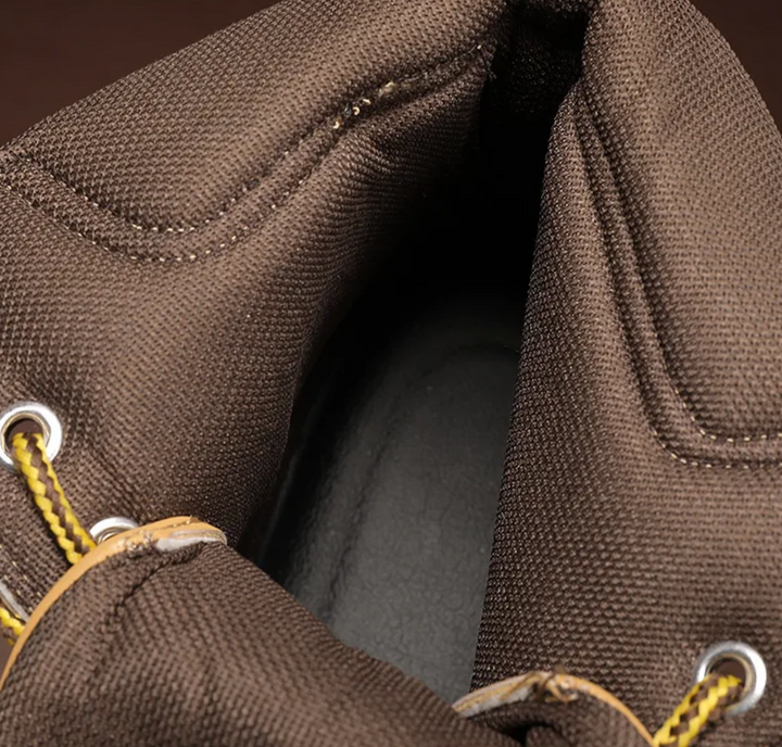 Stijlvolle bruine herenboots met uniek patchwork detail, casual en toch chic.