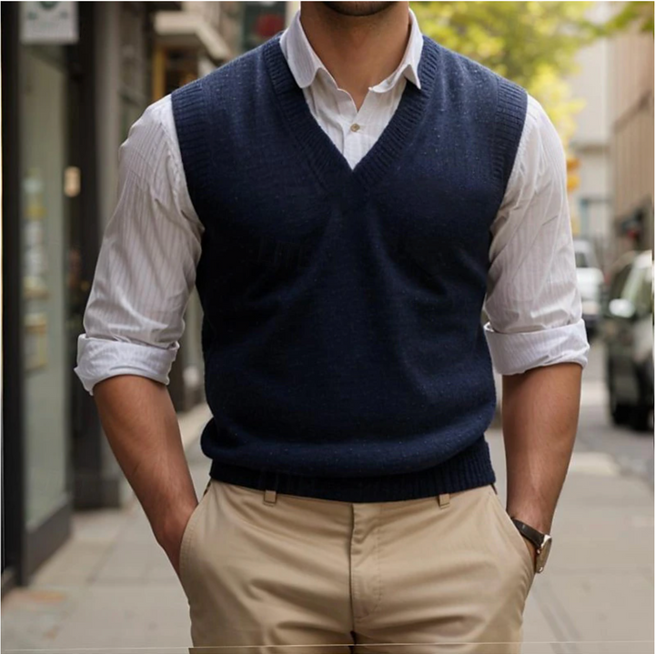 Klassiek mouwloos herenvest met V-hals, perfect voor formele of casual gelegenheden. Verkrijgbaar in blauw en rood.