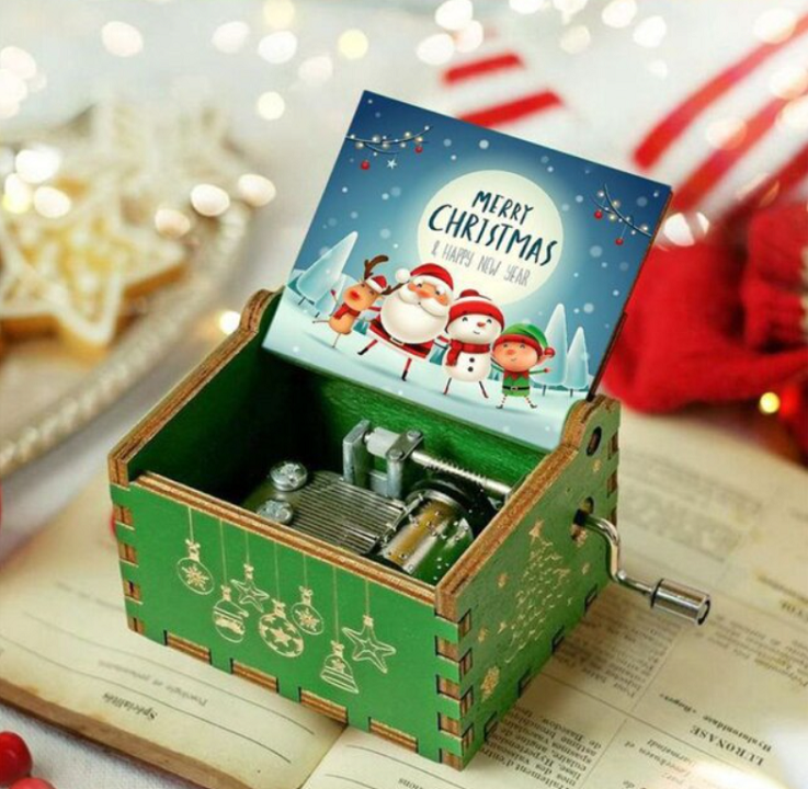 Magische houten kerst muziekdoos, brengt winterse sfeer en vrolijke klanken in huis.