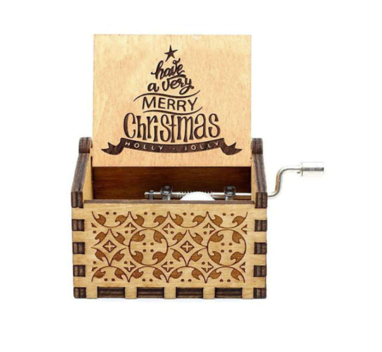 Handgemaakte houten kerst muziekdoos, gedetailleerd ornament voor feestdagen decoratie.