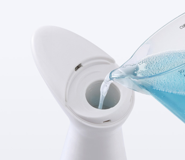 Stijlvolle ABS contactloze schuimzeepdispenser met sensor, waterdicht design voor hygiëne thuis.