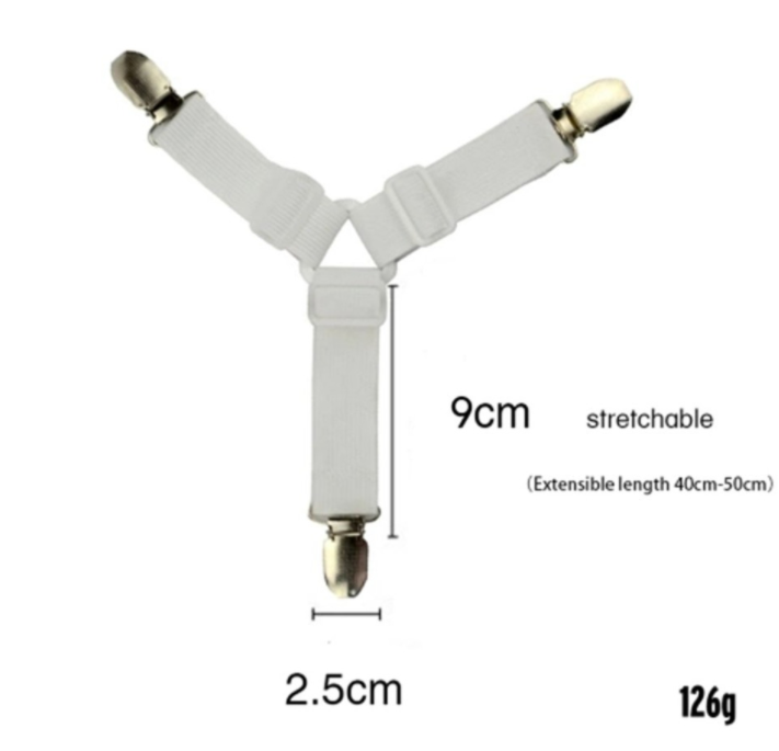 Witte, stevige lakenspanner clips met elastische band, klaar voor antislip bevestiging van het hoeslaken.