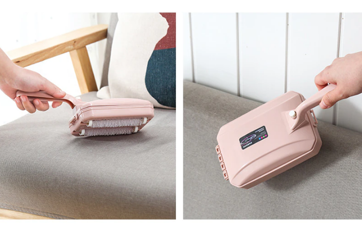 Compacte handveger voor tapijt en vloerkleed; ideaal voor snel en makkelijk schoonmaken in huis of kantoor.