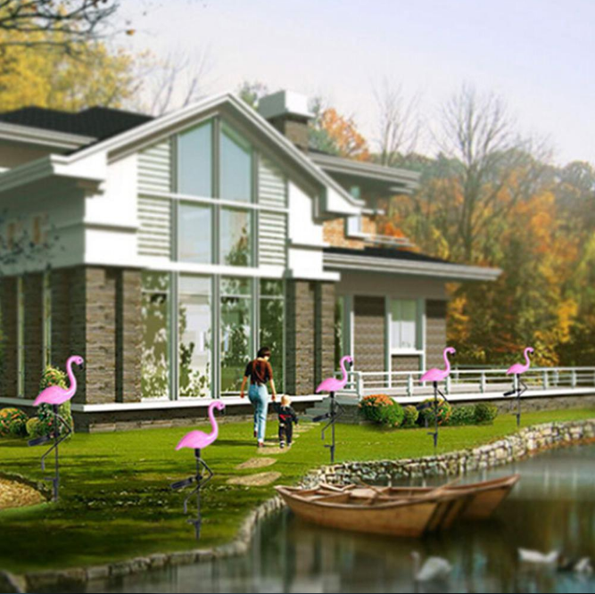 Roze LED solar flamingo tuinlamp, sfeervolle tuindecoratie en energiezuinige buitenverlichting.
