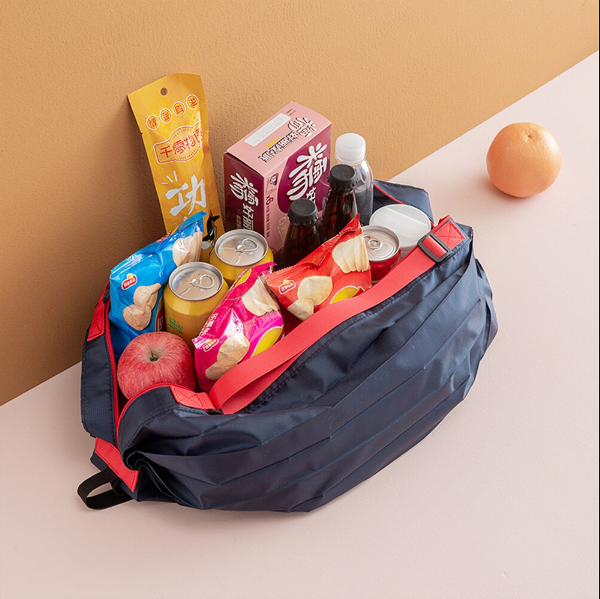 Comfortabele en sterke handvatten van deze herbruikbare boodschappentas, perfect voor zware items.