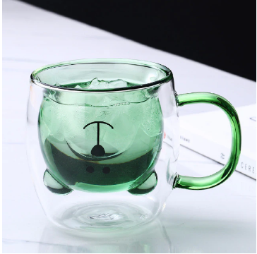 Transparante dubbelwandige theemok. Houdt drank langer op temperatuur, elegant design van isolerend borosilicaatglas.
