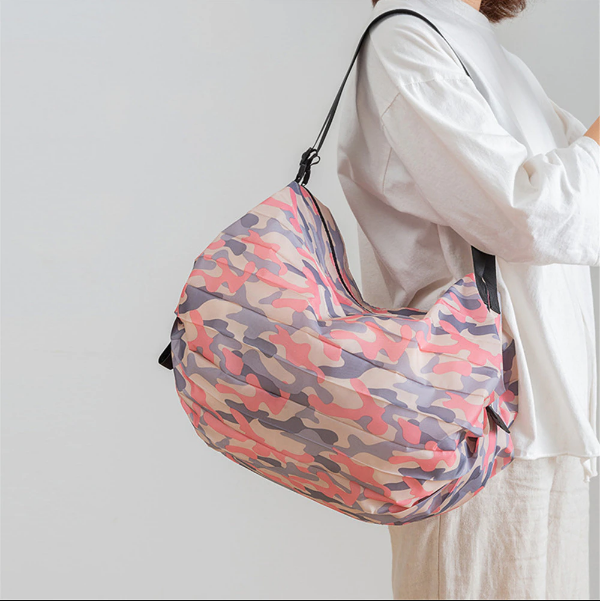 Handige compacte opvouwbare draagtas voor dames, ideaal voor reizen, winkelen en als extra tas.