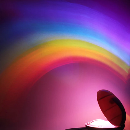 Regenboog projectielamp creëert magische sfeer met levendige LED kleuren voor slaapkamer of woonkamer.