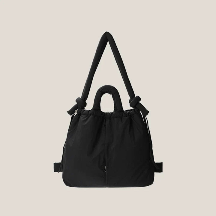 Ruime dames puffer handtas met interne vakken. Perfect georganiseerd en makkelijk mee te nemen als schoudertas.