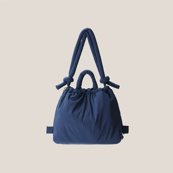 Chique witte dames puffer handtas, elegant en functioneel. Een zachte en trendy toevoeging aan je dagelijkse outfit.