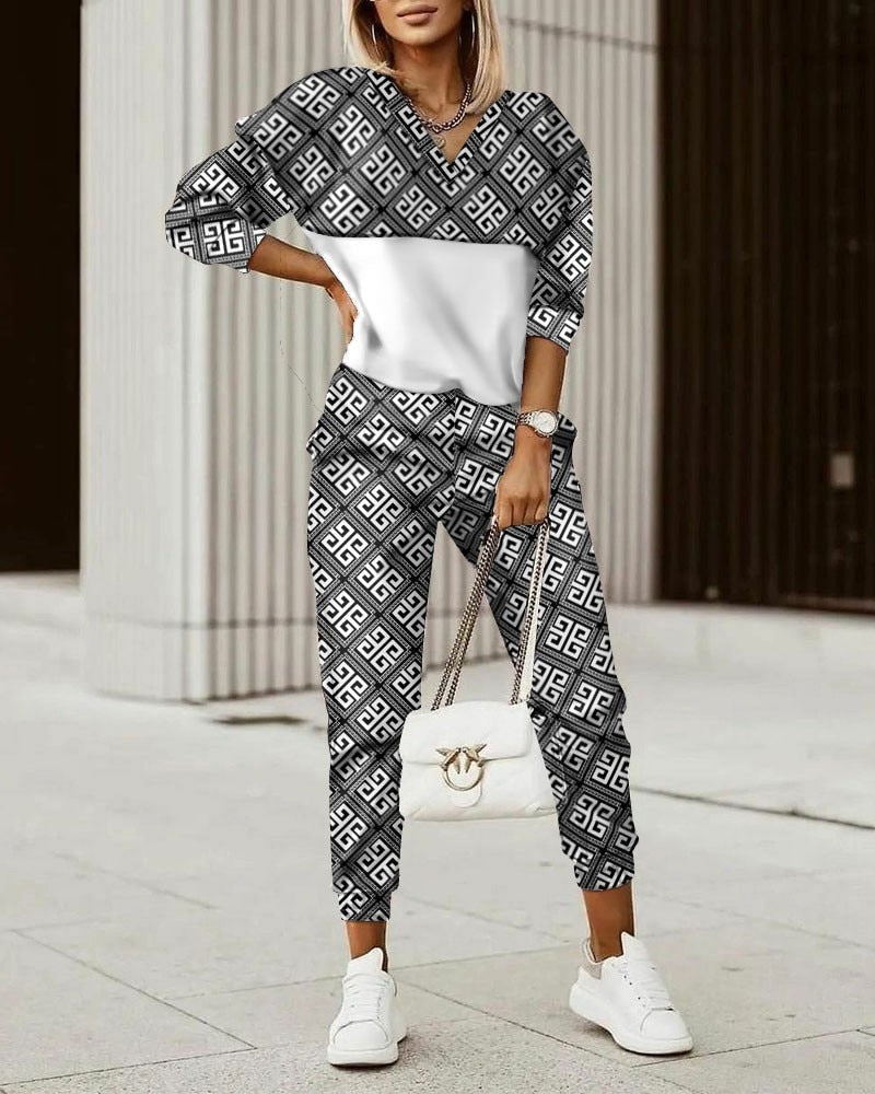 Grijze Dames Mila tweedelige set, elegante outfit voor casual en sportieve look.