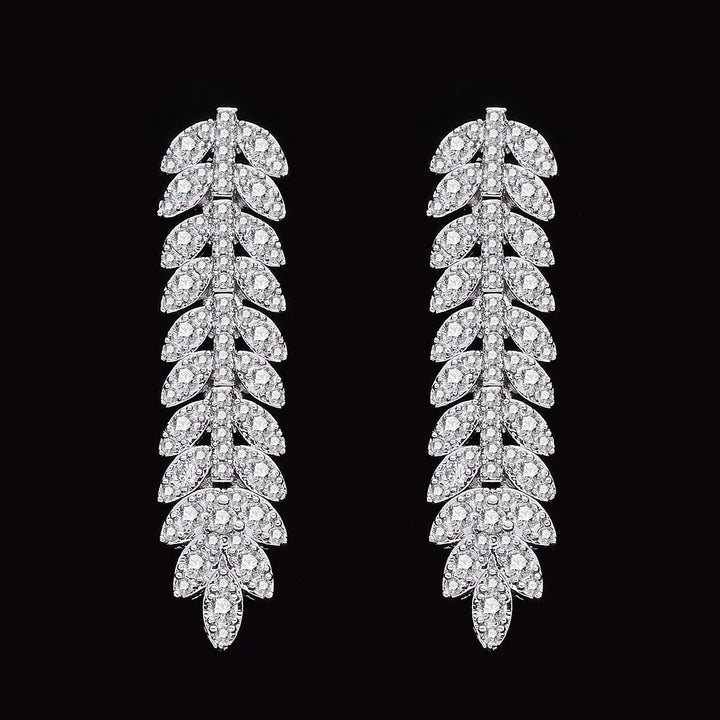 Elegante zirkonia bruidsarmband en schitterende ring, onderdeel van de luxe 4-delige dames sieradenset.