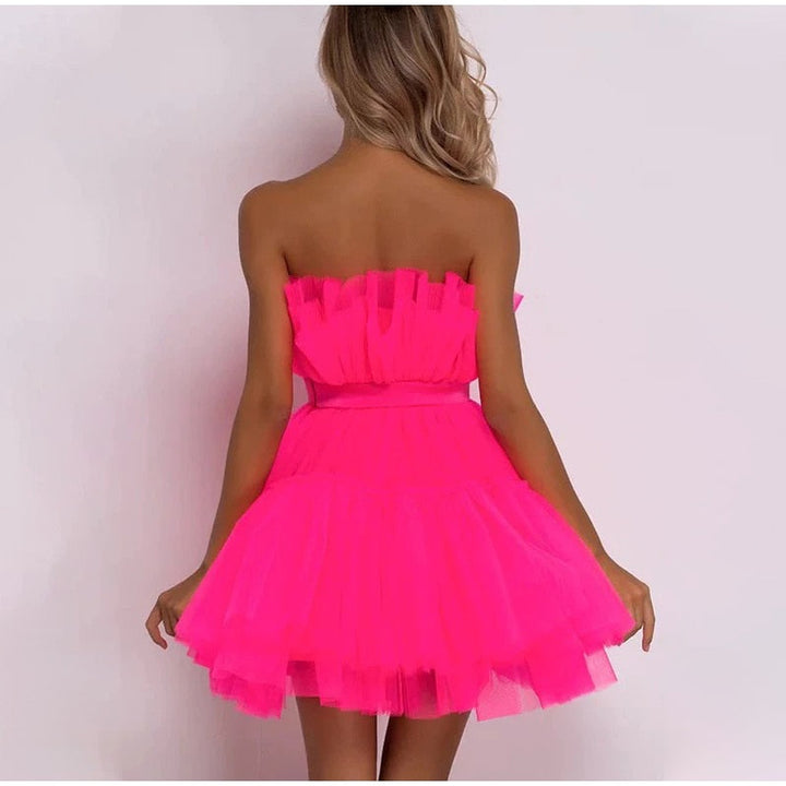 Strapless damesjurk roze, elegant design, perfect als zomer- of feestjurk.