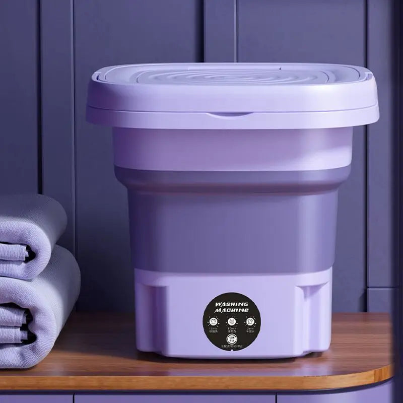 Compacte opgevouwen wasmachine. Ideaal voor opslag, reizen, campers en kleine appartementen.