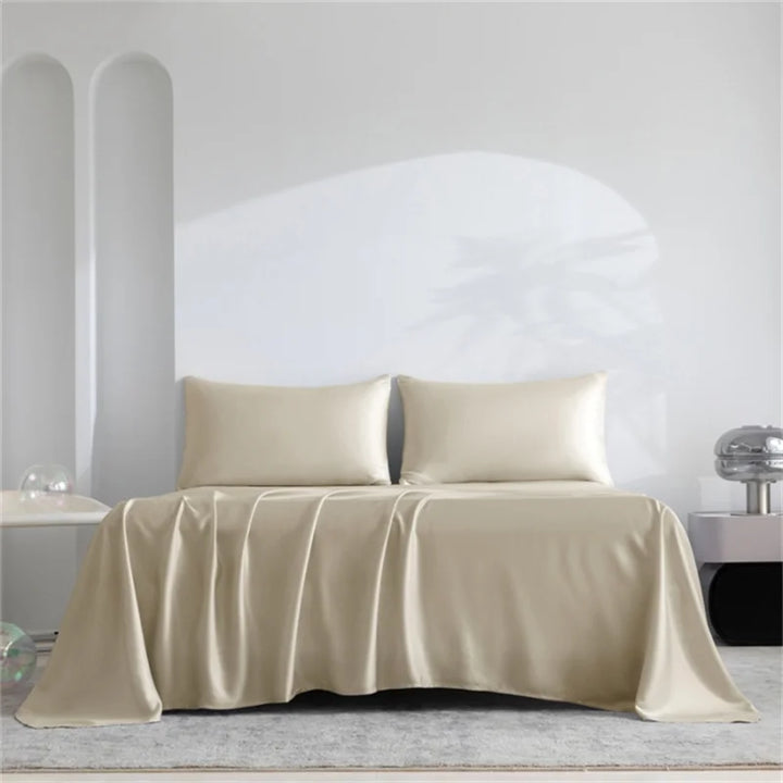 Hypoallergeen en ademend zijdezacht laken; perfect beddengoed voor een gezonde slaap.
