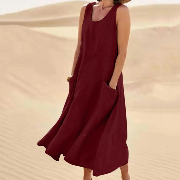 Mouwloze linnen zomerjurk voor dames, comfortabel en luchtig, perfect als strandjurk of casual look.