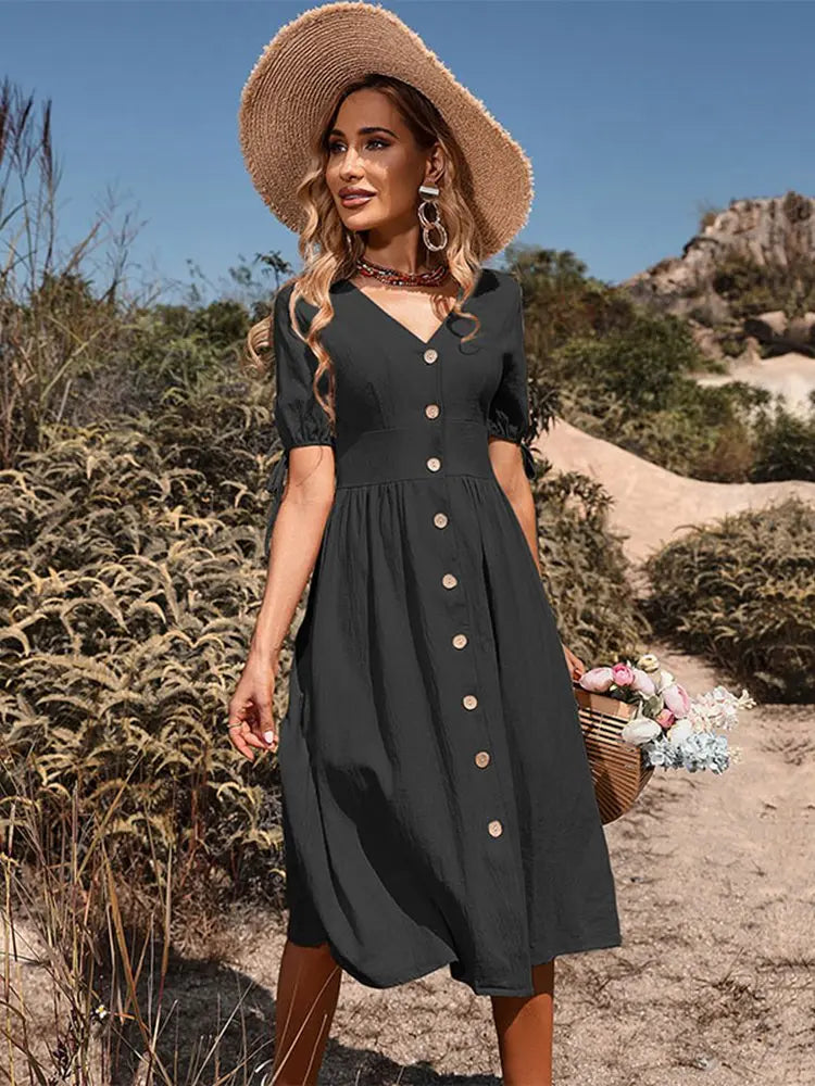 Comfortabele en elegante dames V-hals zomerjurk, ideaal voor lente en warme dagen.