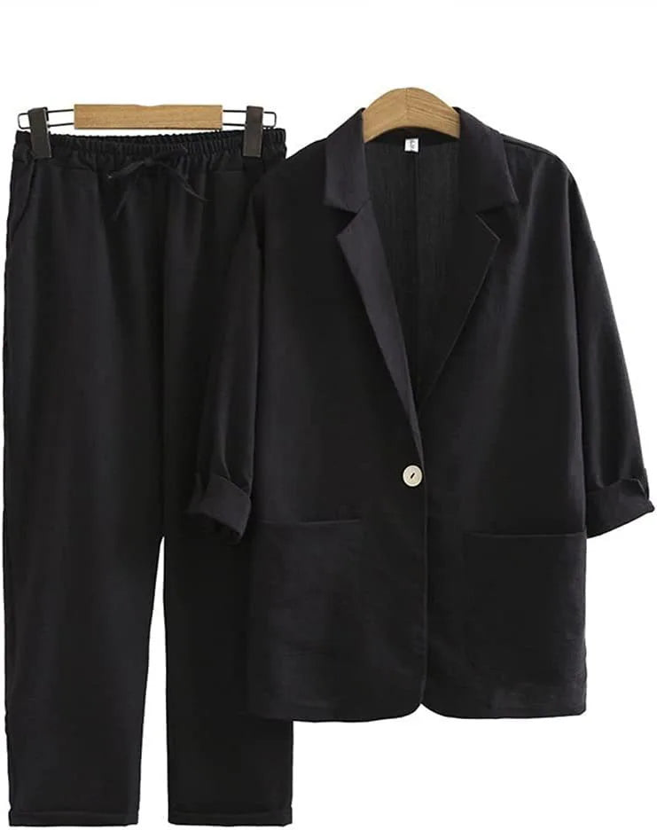 Gele dames tweedelige set met luchtig jasje en rechte broek. Perfect voor lente/zomer mode.
