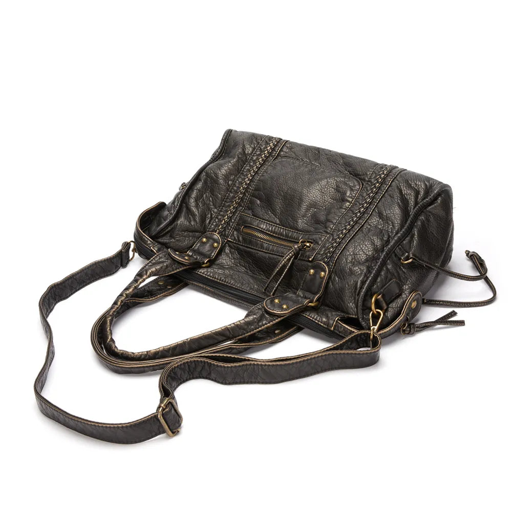 Zwarte retro handtas voor dames, elegante en grote schoudertas, ideaal als werktas of dagelijkse tas.